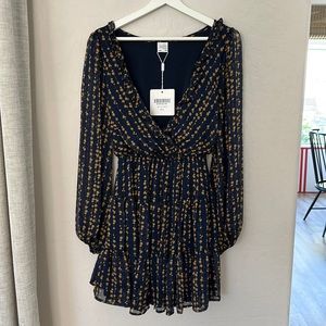 Selfie Leslie size Med V-neck ruffle dress.  Main color is Navy. Super cute!